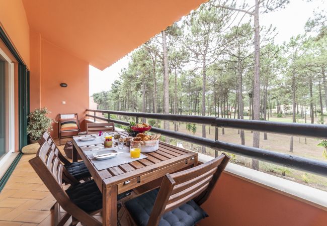 Balcony overlooking nature where you can enjoy breakfeast with the family.
