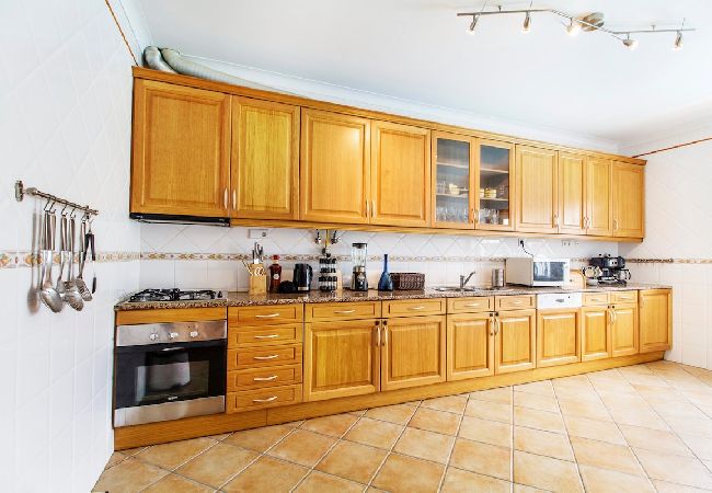 Fully equipped kitchen with all amenities.